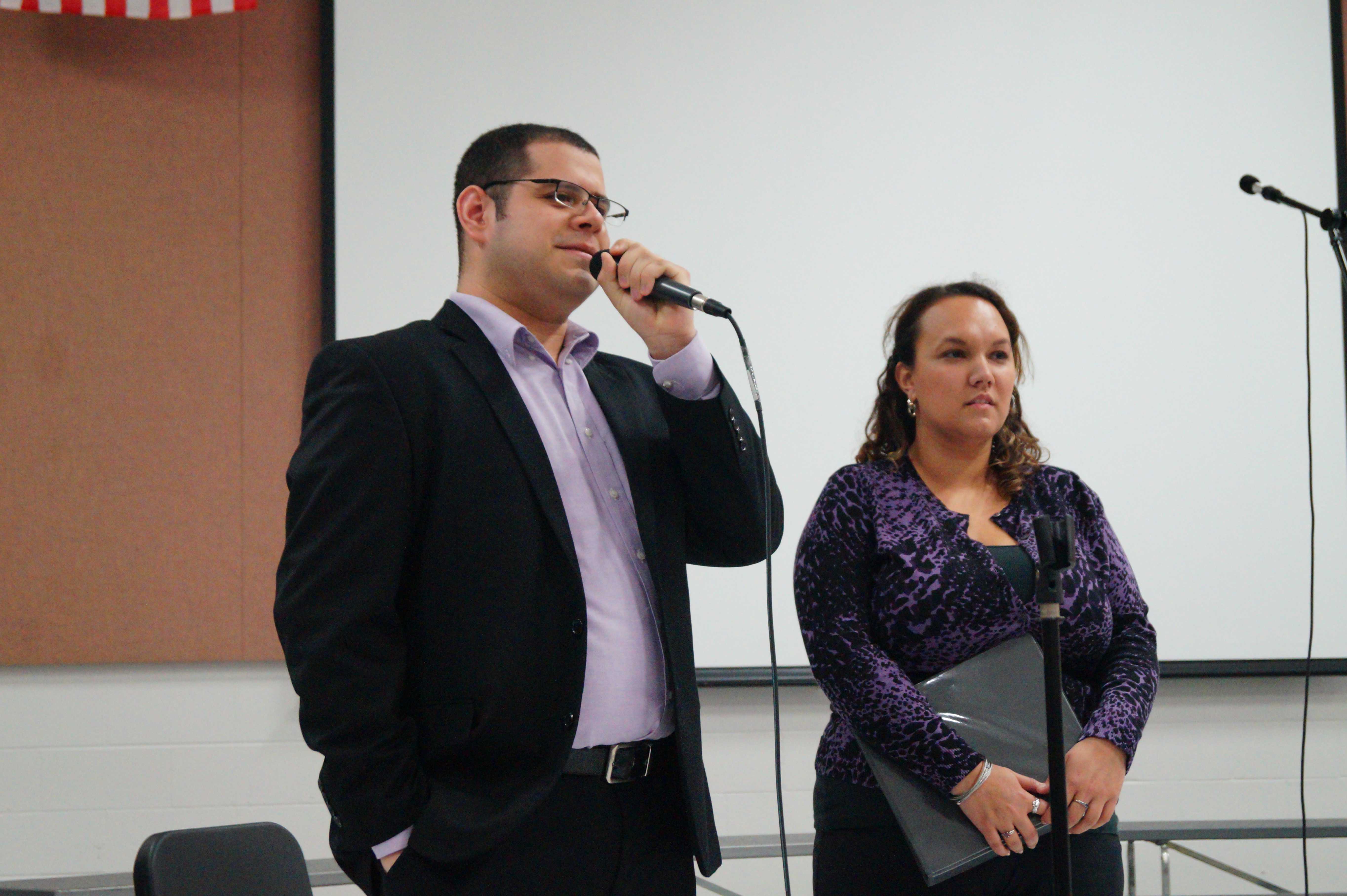 Choir directors Fredy Bonilla and Vanessa Winslow