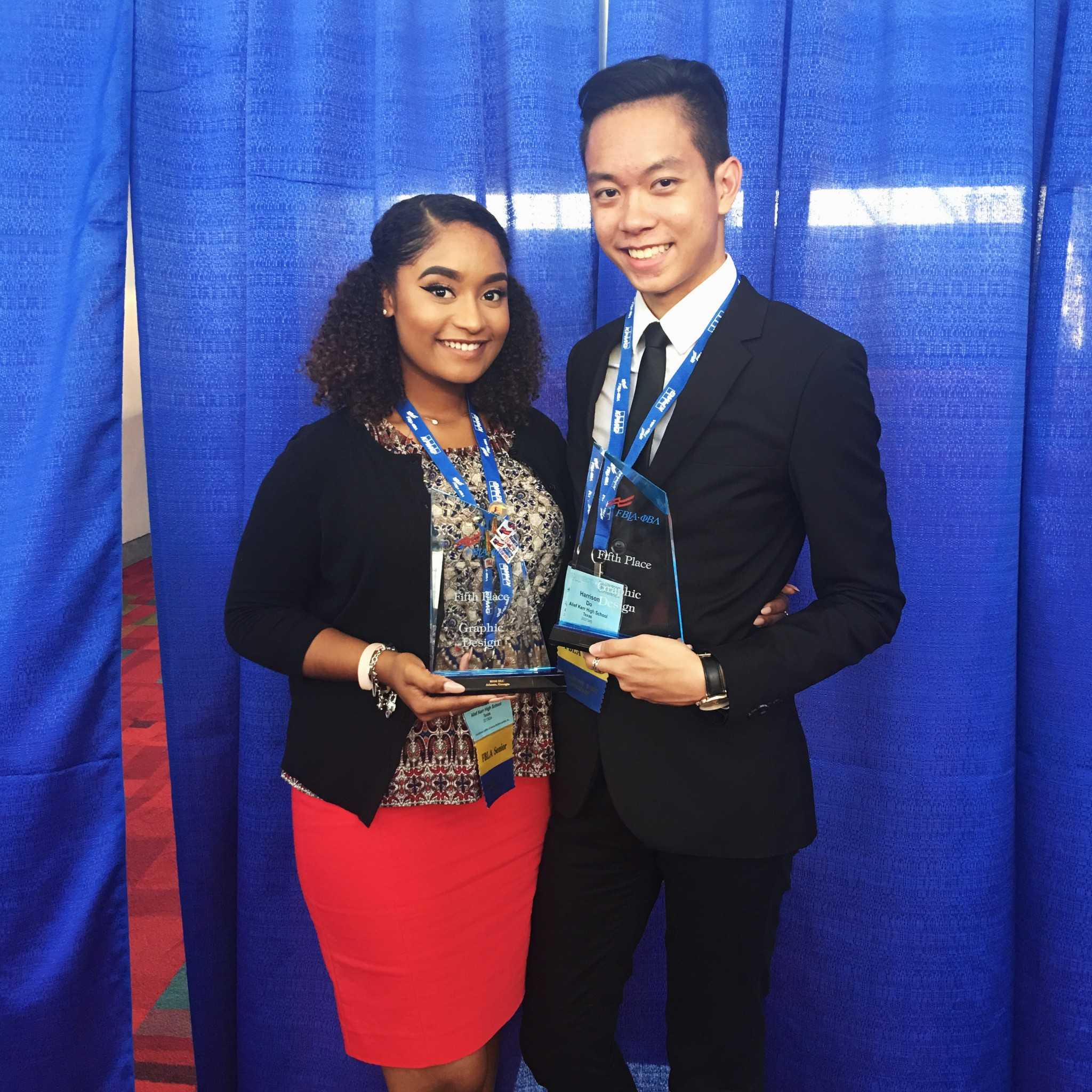 Dara Hall and Harrison Do hold their awards.