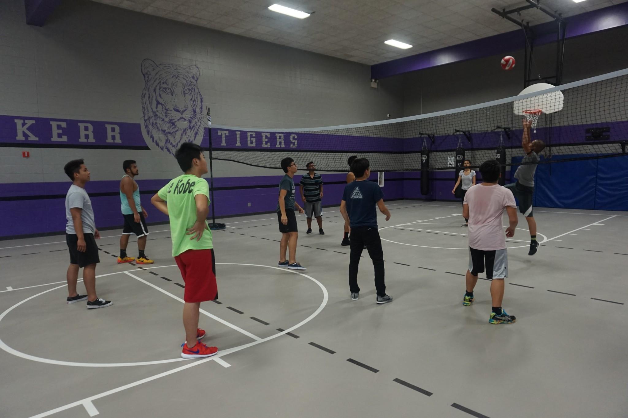 Gym students are seen here playing a friendly game of volleyball 