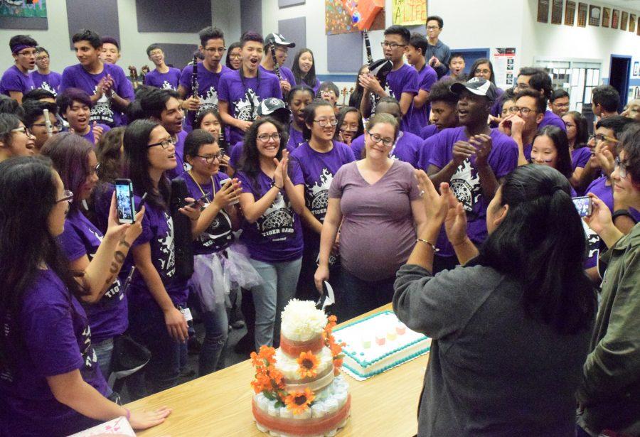 Band students surprised Ashley Siegrist (center) with a baby shower. Siegrist’s baby was born on Thanksgiving. 