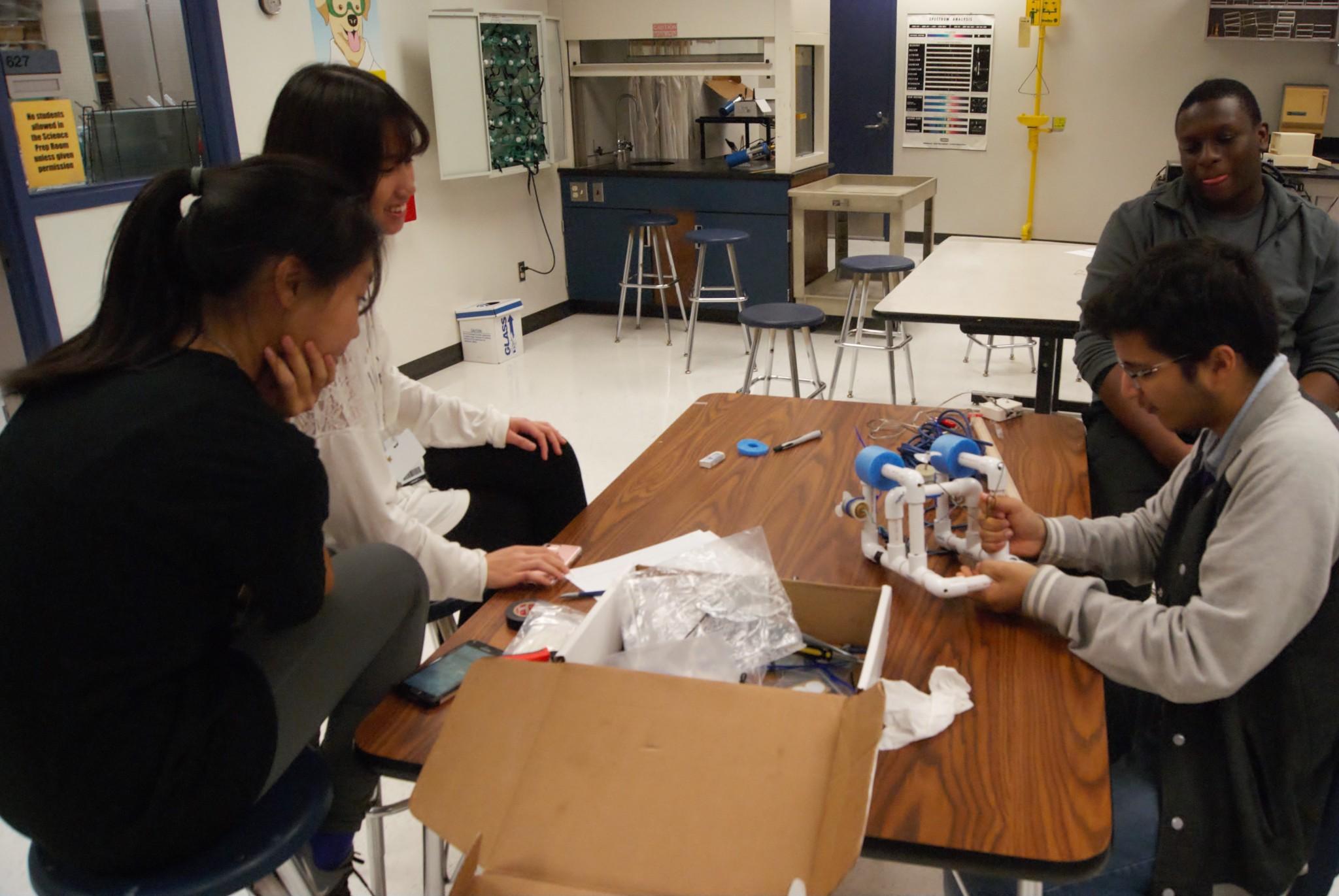 Engineering Club Members preparing their group's Sea Perch