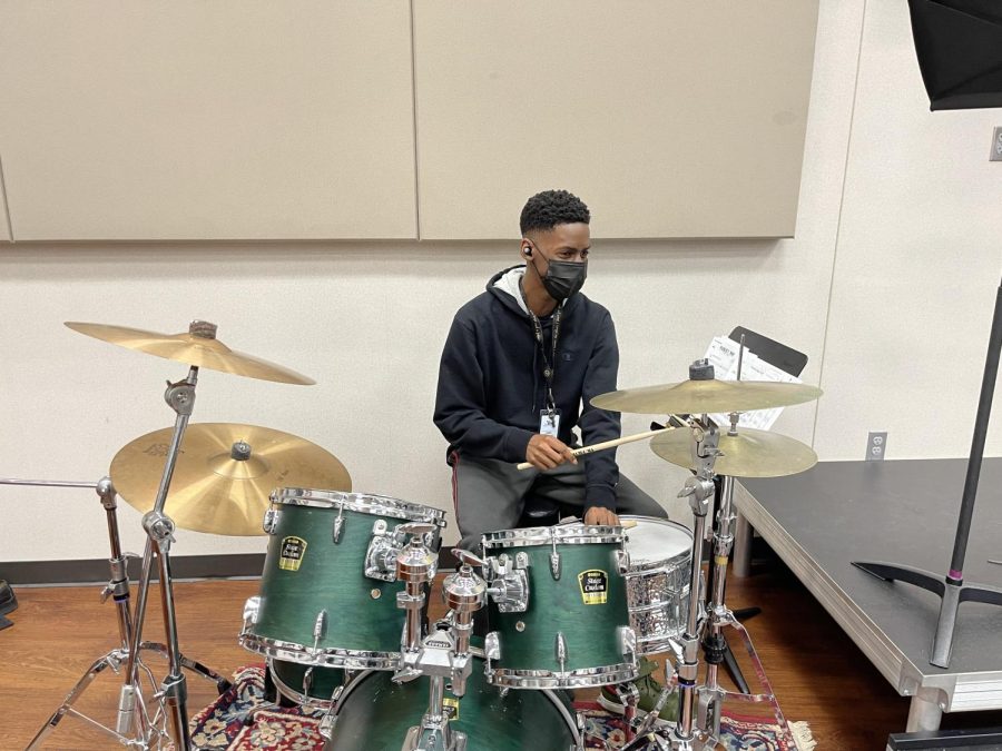 Bam! The room is filled with sounds of Band Member Daniel Oluwasegun. I like practicing my music rudiments during lunch. said Daniel Oluwasegun 