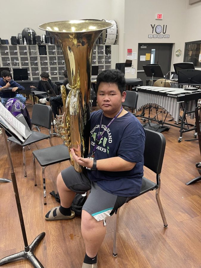Wham! The Band room is filled with noise as Luat Dinh Phan practies his solo on his Tuba!