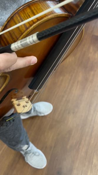 A closeup of Luongs violin