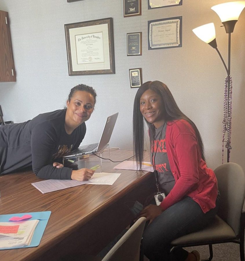 Denae Aquil and Sherry Iyamu confer in their offices