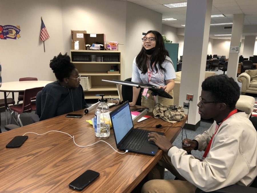 The FBLA officers gather around the conference table at their bi-weekly meeting. They discuss the logistics of a November social. We want to do something for our members to have fun and get to know each other, Casey Nguyen said.