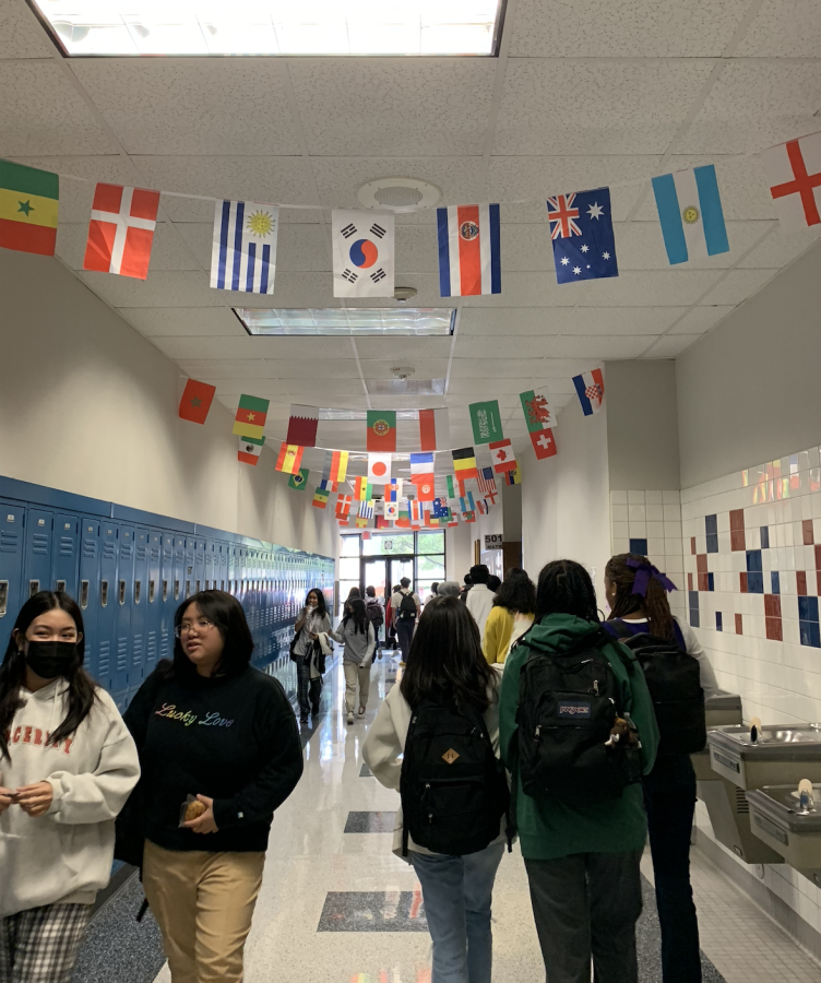 Soccer Decorations -- The entire school is covered with World Cup decorations from soccer club. In this photo, the math and English hallways are hung with flags of around the world. My team and I worked hard to raise money for the 2022 World Cup and as always, I am proud of everyone, Medina- Avila said.