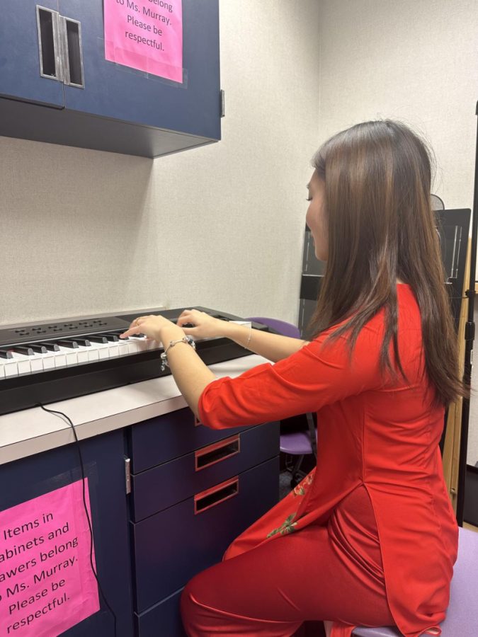 Ashley Tran is in the music lab playing the Electric Keyboard. Ashley Tran is a sophomore at Kerr High School. Ashley has been playing piano since elementary school. I really like playing the piano. One of my favorite songs to play is from the movie Coraline.