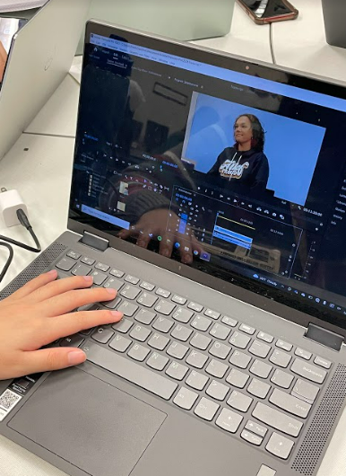 Audio Video Production member, Lillian Tan, working on the Teacher of the Year 2023 issue.