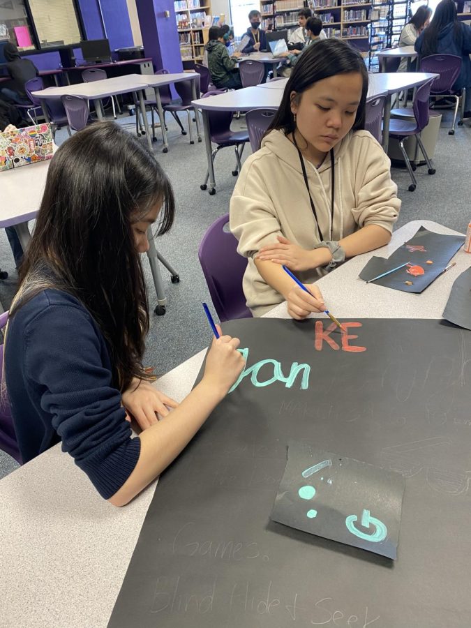 STUHUM Officers diligently working on their handmade poster. “I’m so proud of how our poster turned out,” Vice President Natalie Nguyen Said.