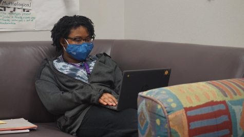 Saying Goodbyes: Junior Chikanyima Brown-Nkemdirim takes notes for the podcast meeting. The club has not met for multiple weeks. 