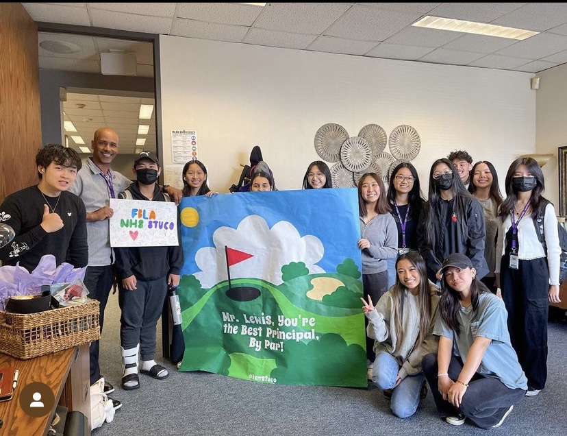 This week has been tee-riffic! On Monday, May 1, 2023 FBLA officers collaborated with NHS, Student Council, and Class of 2023 to prepare a gift basket and poster to surprise Mr. Lewis. The gifts had been golf themed, one of Mr. Lewis’ hobbies. 