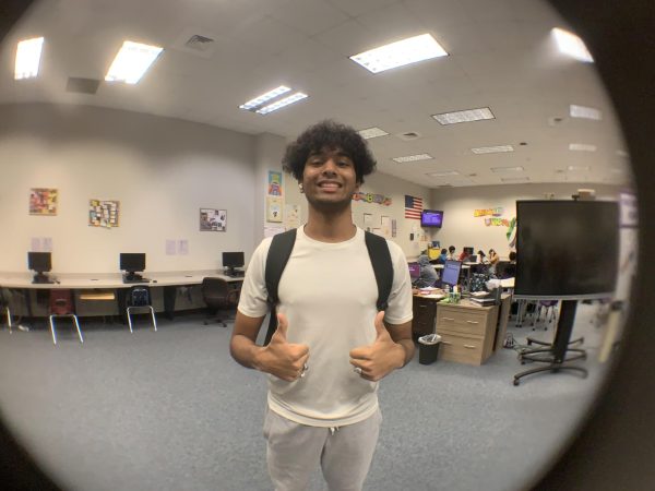 CHEESE!
Syed Raza was seen in English for an officer meeting. He is currently in Stuco and participates in organizing events. Fear has killed more dreams than failure ever has, Raza said.