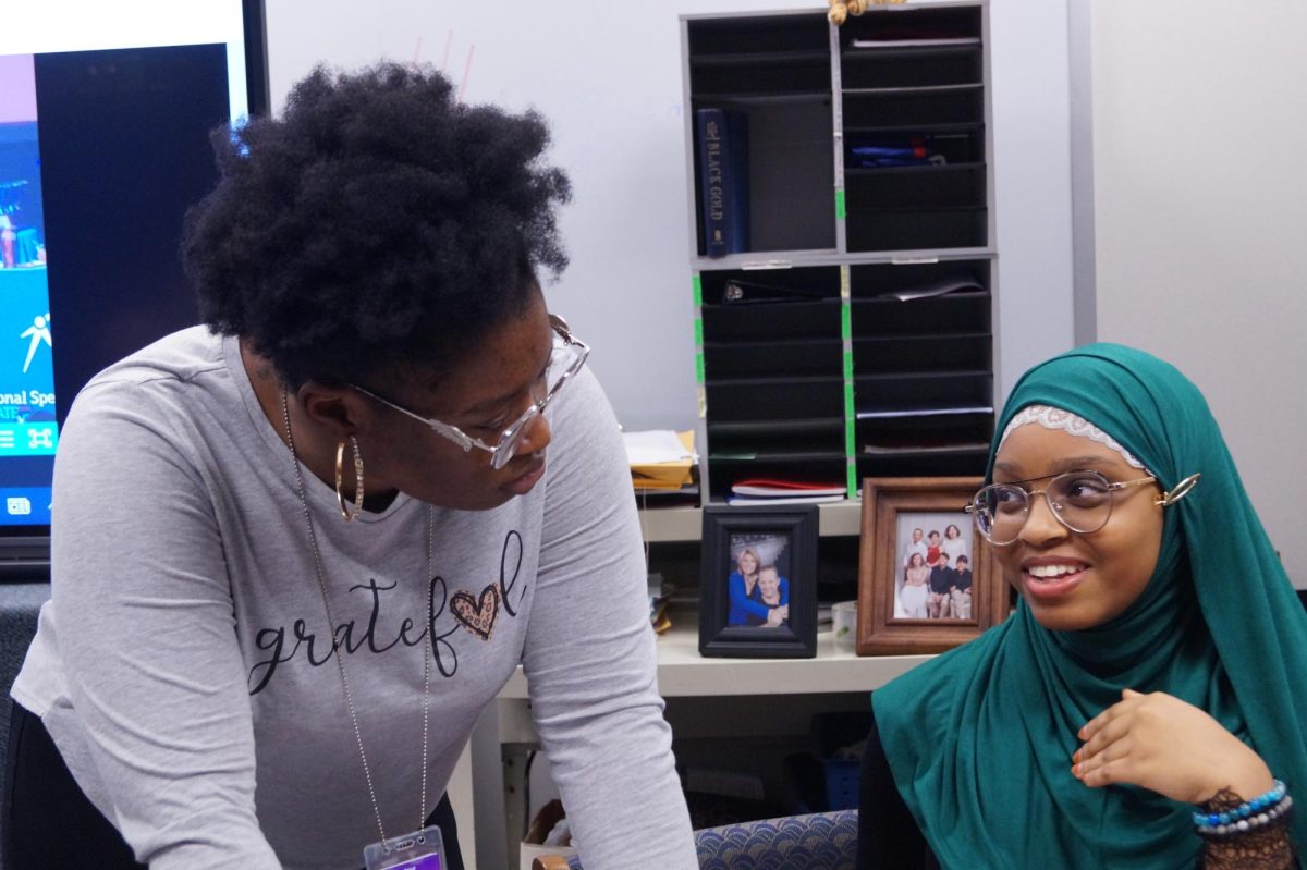 Shalom Akinkunmi and Naseem Saeed work on enhancing Saeeds oratory piece. She is a novice speaker who has been working on her piece since 8 grade. I was born for oratory, said Saeed.