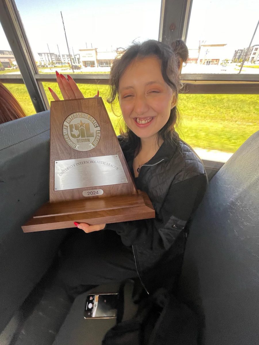Victorious+Day.+Gomez+showcases+her+team+winning+for+Non-Varsity+Choir+UIL.++Gomez+explained+this+UIL+felt+like+a+more+intense+version+of+her+choir+practice.+First+and+last+UIL+and+we+sweeped+that+UIL+clean.+Gomez+said.+