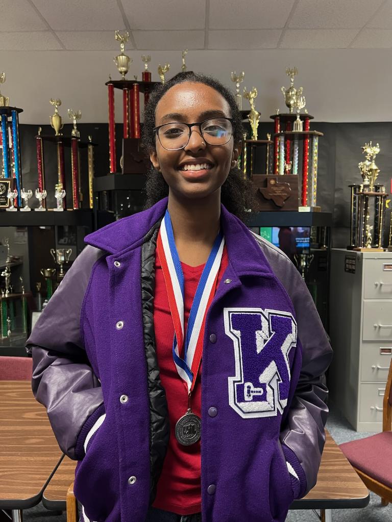 Silver+Medals%0ALeah+Ghebrelul+poses+for+a+picture+in+the+speech+room+after+advancing+to+regions+in+UIL.+After+competing+in+both+LD+and+Extempt%2C+she+secured+the+win+in+the+latter.+I+had+a+lot+of+fun%2C+and+Im+excited+for+regions%2C+Ghebrelul+said.