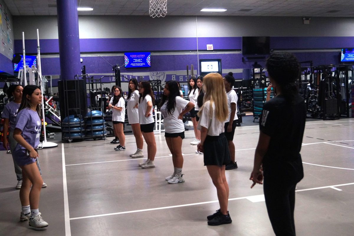 Hitting the Beat! Nyla Whiteside and Connie Nguyen demonstrate dances to learners. Whiteside went over the hustle routine and Nguyen helped with formations. "We have a lot of school spirit for a school with no sports," Whiteside said. 