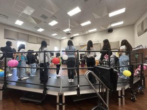 Listen Up! Beginner choir students rehearse during advisory. Vanessa Winslow ensures the talented group stays on track for their upcoming choir showcase. “Ready, set, go,” Winslow said.