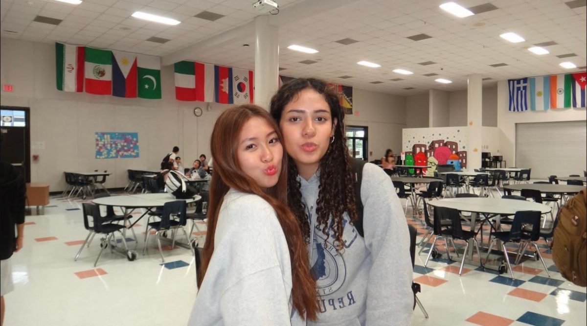 Photos for Memories: STUCO members Jessica Le and Litzahaya Gallardo pose for the camera. These photos will be placed in STUCO’s digital footprint for all their general meetings. “Seeing all my friends, the new freshman, and everyone at the STUCO meeting was great. It really feels like school is back in session,” Le said.