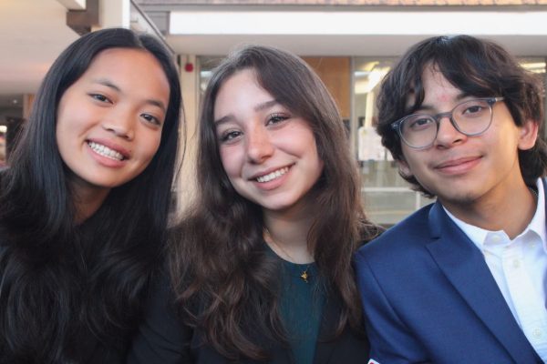 Beaming Smiles

Abigail Nguyen, Sarah Abi Saab, and Esai Moreno pose for a picture after advancing to semifinals in the Springwood Memorial Swing tournament. With only a few minutes till the next round, they enjoyed themselves with a last minute UNO match. "I wasn't able to compete both days, but the time I was there was fun," Nguyen said.