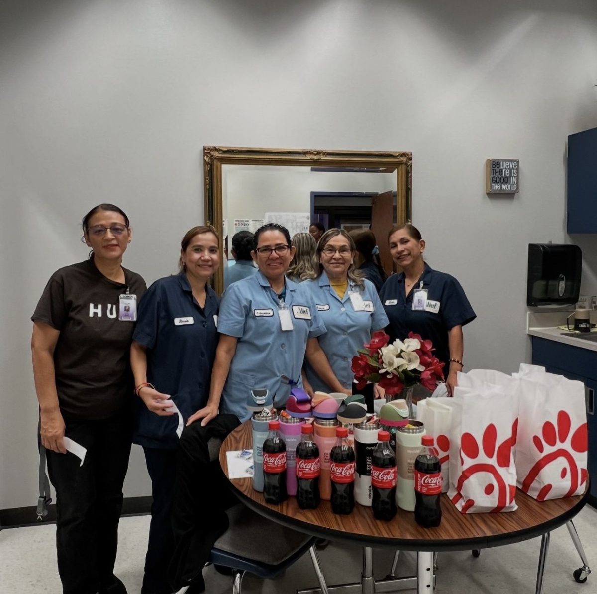 Happy National Custodian Day! Custodial pose for photo. The staff were gifted with meals and Owala water bottles from STUCO and FBLA. "We thank them so much for all their hard-work," Chelsea Eboh said.