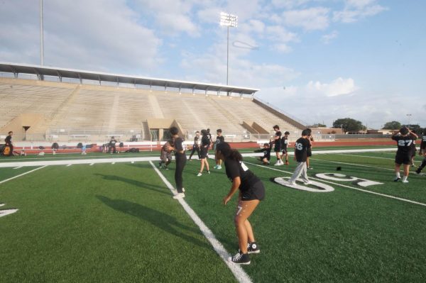 Seniors and Freshmen practice on the field before their flag football showdown against the Juniors and Sophomores on October 30th. The players worked on their formations and teamwork, building up tension for the game ahead. The anticipation was high as everyone aimed to give their best performance on the field.