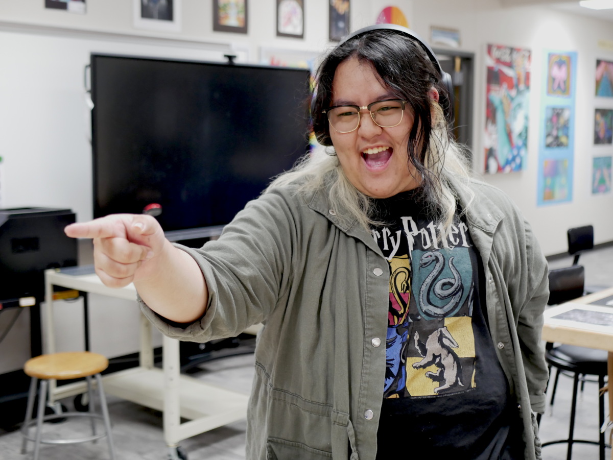 Mikayla Diep practices one of her songs in the 2D Art Room. 