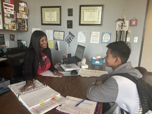 Sophomore Season! Sherry Iyamu and Quoc Tran are in their scheduled one-on-one sophomore meeting. Iyamu reviews courses Tran has taken and offers recommendations for his junior year. "Do you have any questions about junior year?" Iyamu said.