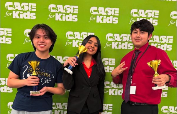 Dat Nguyen, Haniyah Lutfi, and Alan Parra pose with their first, second, and third place trophies at City Qualifiers. All of these debaters were competing in varsity congress. "For my city qualifiers tournament, I found it very fun and unique from others. I think that CASE tournaments allowed for all the congressional debaters to bond with eachother, and so rather than feeling you did bad after rounds, you felt like you had a group supporting your back! Overall it was very fun," Nguyen said.