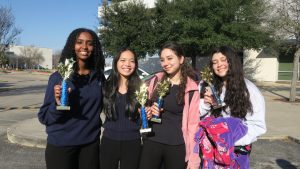 Leah Ghebrelul, Abigail Nguyen, Sarah Abi Saab, and Erica Carranza (Team LASER) pose for a picture after becoming finalists in the City Championships.