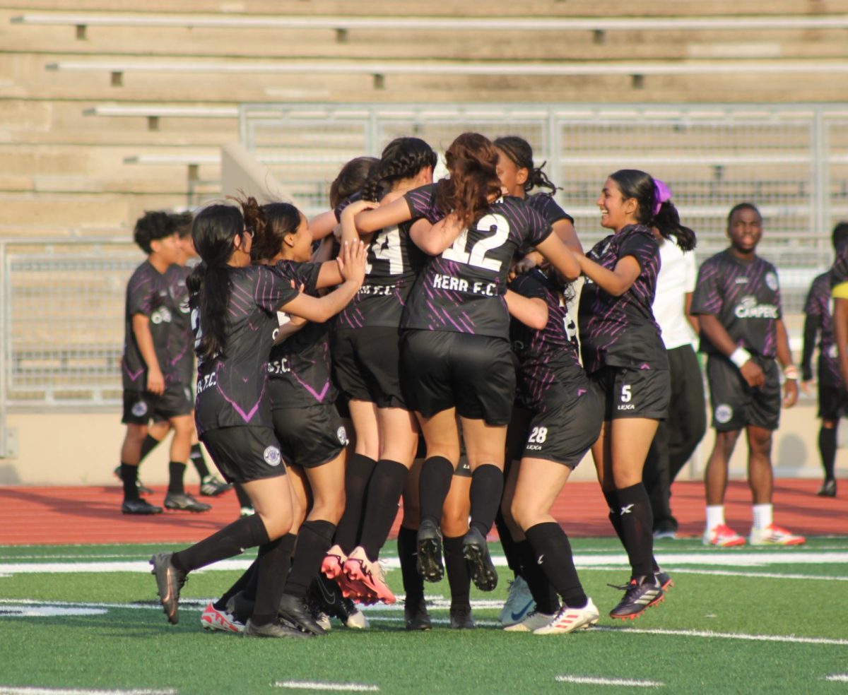 Celebration Time! Girls soccer team celebrates win. They finished the game around 6:20 pm. 