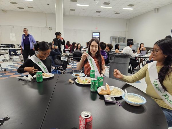 One Last Time: Secretary Loreal Long, President Iris Hoang-Dugan, and Vice-President Alisha Rahman discuss how to pronounce the names of members. They practice what they will say as officers one last time. "I wasn't expected so many people to show up, but they did," Hoang-Dugan said. 