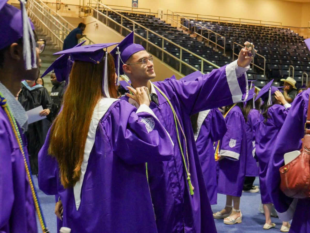Guillermo Palacios takes a selfie with his friends.