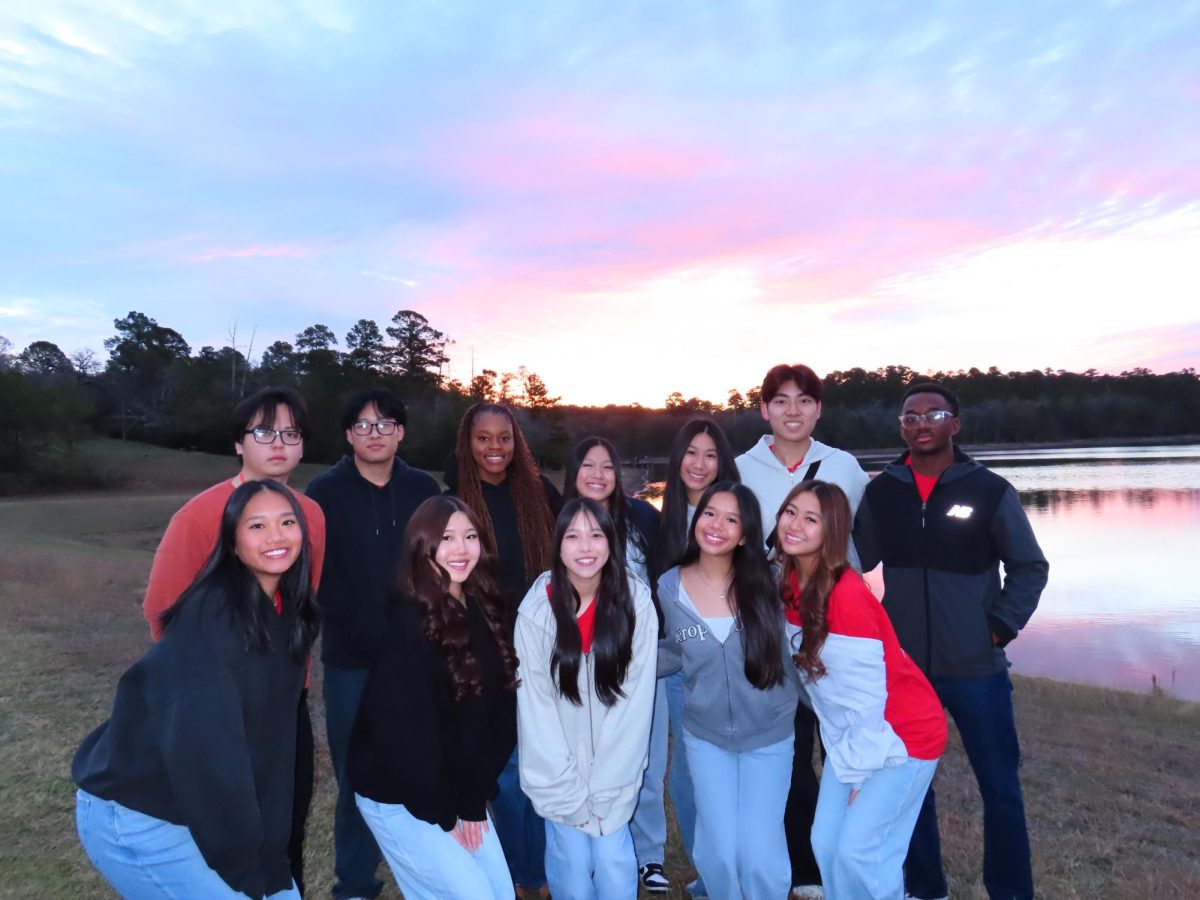 Leadership In Action: Student Council members Chelsea Eboh(12), Lisa le(12), Emmanuel Okojori(12), Janet Duong(12), Jessica Le(11), along with Executive Board members Bransun Luu(12), Peter Bui(11), Yahan Dai(10), Ryan Nguyen(12), Emily Le(11), An Nugyen(10), Katelyn Nguyen(10), take a picture to remember the memories they made at Camp Allen in Navasota, Texas. This STUCO trip was not only focused on having fun as a group but learning how to develop one's leadership skill.  "The trip was really fun, especially since we had the opportunity to engage with and learn from other student councils," Okoroji said.
