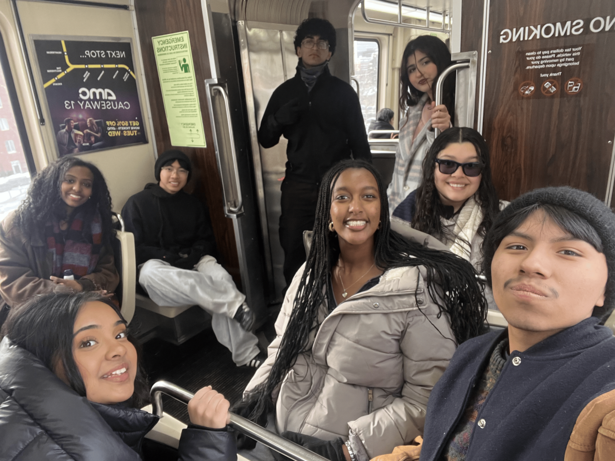 Case Closed: Leah Ghebrelul, Sofia Lutfi, Preston Nguyen, Syed Ali, Sophia Ghebrelul, Maryam Al Gailani, Erica Carranza, and Gerardo Diaz sit in the train on their way to Harvard Square. "While we didn't win the tournament, we were still able to learn about what we needed to work on and see how other teams structured their speeches," Gerardo Diaz said. "Overall, this was an important learning experience I wouldn't have dreamed on missing out."