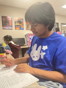 Productive in Art Class: Gerardo Diaz proves his love for art in the Digital Media Art Lab. "I really enjoy participating in this class because of my friends and the work," Diaz said.